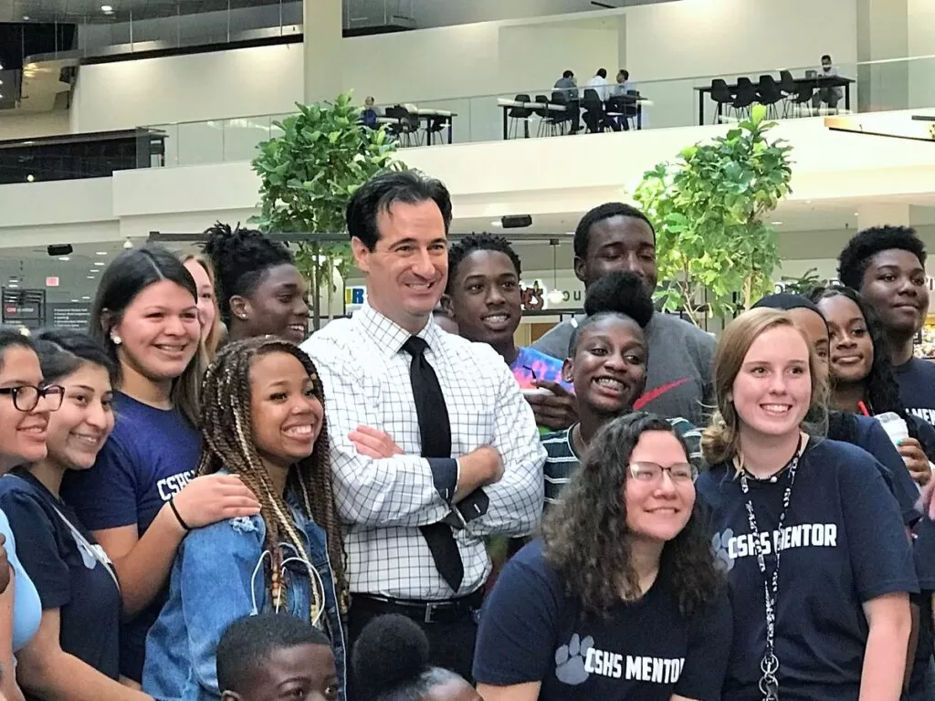 Carl Azuz With Team and Net Worth